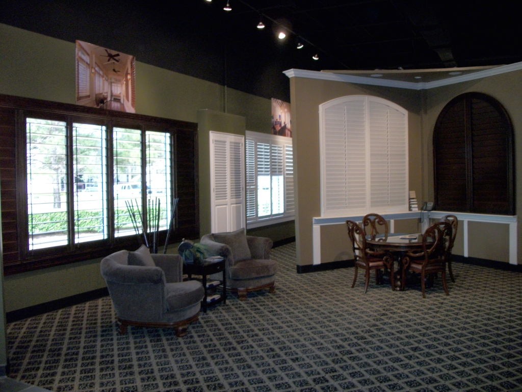 Big arched shutter displays in the Window Fashions of Texas showroom